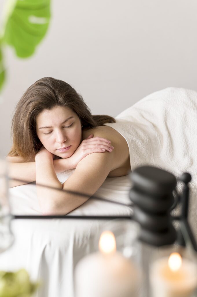 medium-shot-woman-massage-table